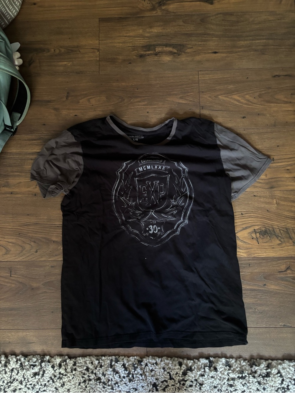 Express Black Tee with Gray Sleeves and Crest Emblem